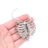 Detail View 3 of A Pair of Death's Arrival White Brass Rib Cage Skeletal Plug Hoop Earring