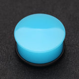 Detail View 1 of A Pair of Neon Colored UV Acrylic Single Flared Ear Gauge Plug-Light Blue