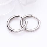 Detail View 1 of A Pair of Implant Grade Titanium Gem Lined Huggie Hoop Earring-Clear Gem