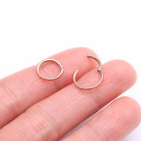 Detail View 2 of Implant Grade Titanium Rose Gold Rigid Rectangle Faceted Clicker Hoop Ring