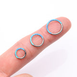Detail View 3 of Implant Grade Titanium Brilliant Fire Opal Lined Front Facing Seamless Clicker Hoop Ring-Blue Opal
