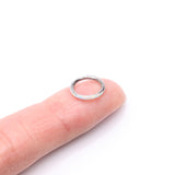 Detail View 2 of Implant Grade Titanium Brilliant Fire Opal Lined Seamless Clicker Hoop Ring-White Opal