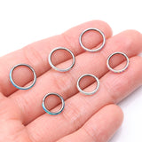 Detail View 3 of Implant Grade Titanium Brilliant Fire Opal Lined Seamless Clicker Hoop Ring-White Opal