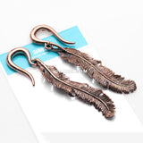 Detail View 4 of A Pair of Vintage Enchanted Bali Feather Copper Ear Weight Hanger