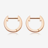 A Pair of Rose Gold Simple Huggie Hoop Steel Earring