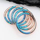 Detail View 3 of Rose Gold Brilliant Fire Opal Lined Front Facing Seamless Clicker Hoop Ring-Blue Opal
