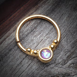 Detail View 1 of Golden Opalescent Grandiose Bendable Twist Hoop Ring-Purple