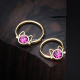 Detail View 1 of Golden Adorable Cat Face Sparkle Captive Bead Ring-Fuchsia