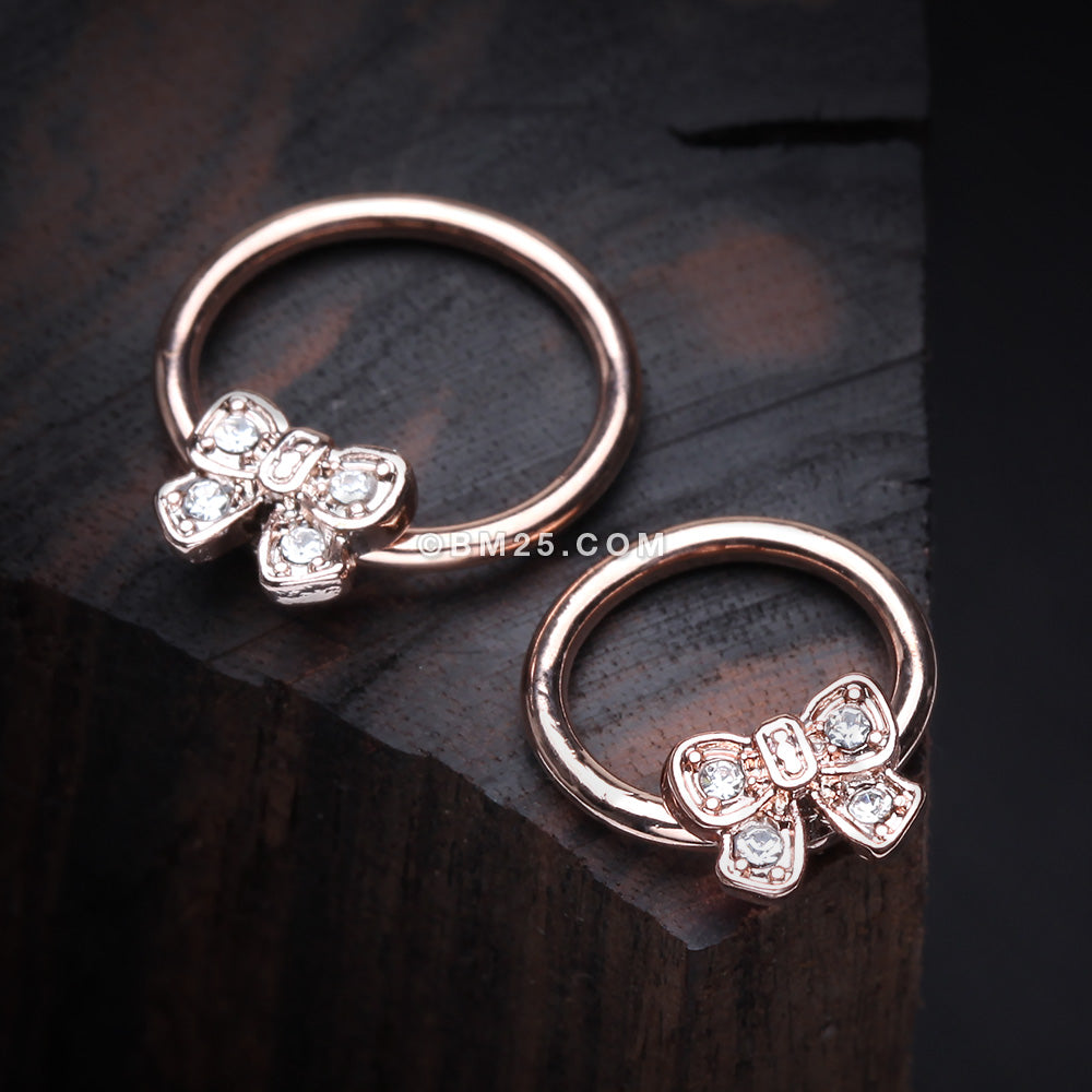 Detail View 1 of Rose Gold Dainty Bow-Tie Sparkle Captive Bead Ring-Clear Gem