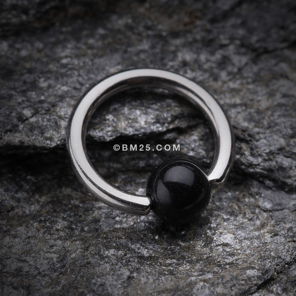 Captive Bead Ring in Steel and Black Opal – Identity Body Piercing