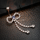 Detail View 2 of Rose Gold Radiant Sparkles Bow-Tie Belly Button Ring-Clear Gem/Tanzanite