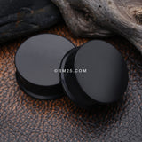 Detail View 1 of A Pair Of Soft Silicone Double Flared Plug-Black