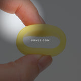Detail View 2 of A Pair of Flexible Silicone Double Flared Ear Gauge Tunnel Plug-Yellow