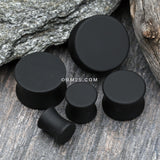 Detail View 2 of A Pair of Silicone Coated Acrylic Double Flared Ear Gauge Plug-Black