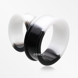 Detail View 4 of A Pair of Black and White Duo Tone Flexible Silicone Double Flared Tunnel Plug