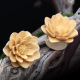 Detail View 1 of A Pair of Water Lily Crocodile Wood Double Flared Plug-Yellow