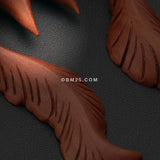 Detail View 2 of A Pair of Leaf in the Wind Sabo Wood Hanging Ear Gauge Taper-Orange/Brown