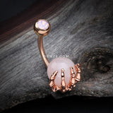 Detail View 2 of Rose Gold Rose Quartz Stone Orb Shine Skeleton Hand Belly Button Ring