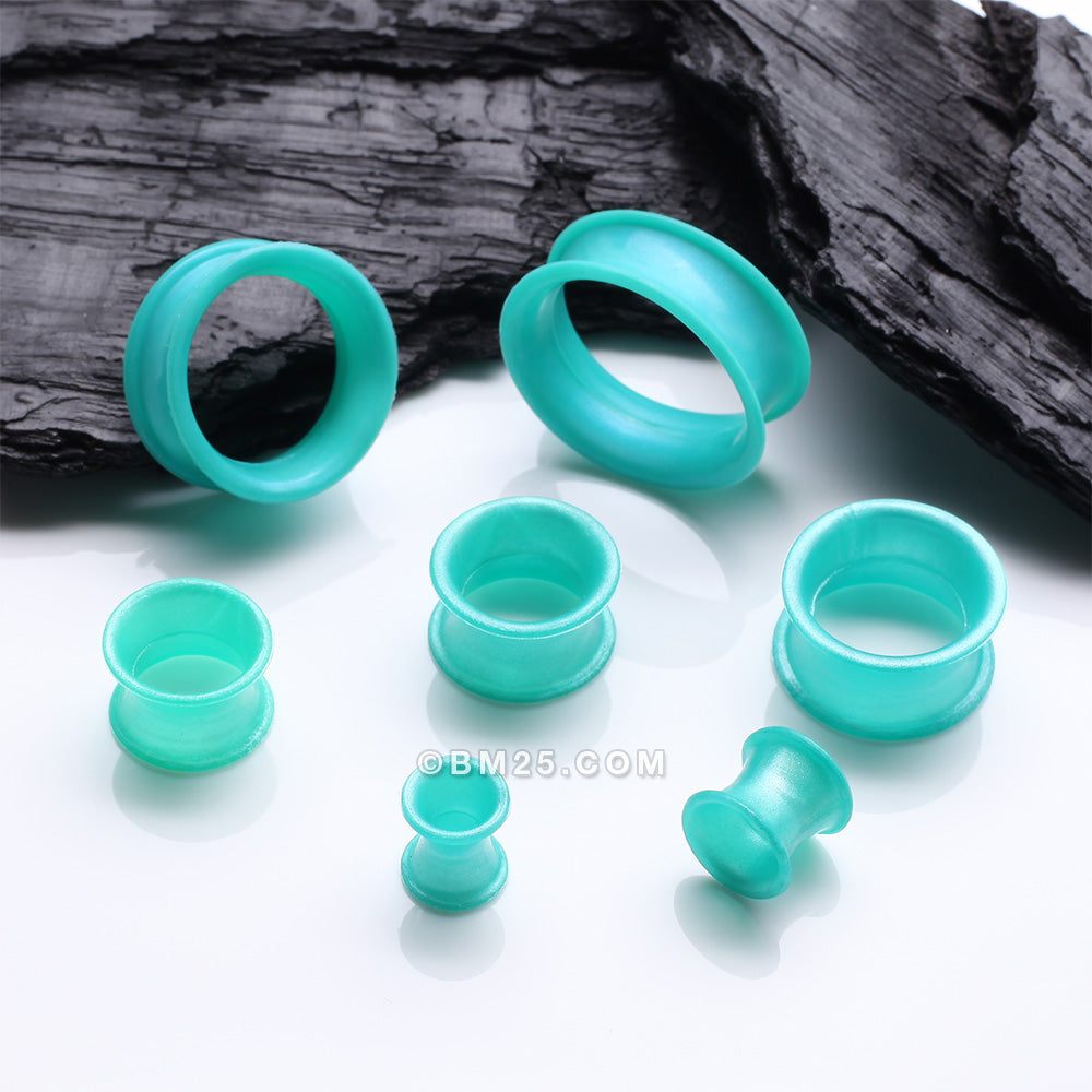 Detail View 3 of A Pair of Teal Flexible Silicone Double Flared Tunnel Plug