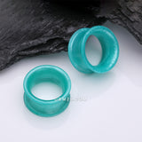 Detail View 1 of A Pair of Teal Flexible Silicone Double Flared Tunnel Plug