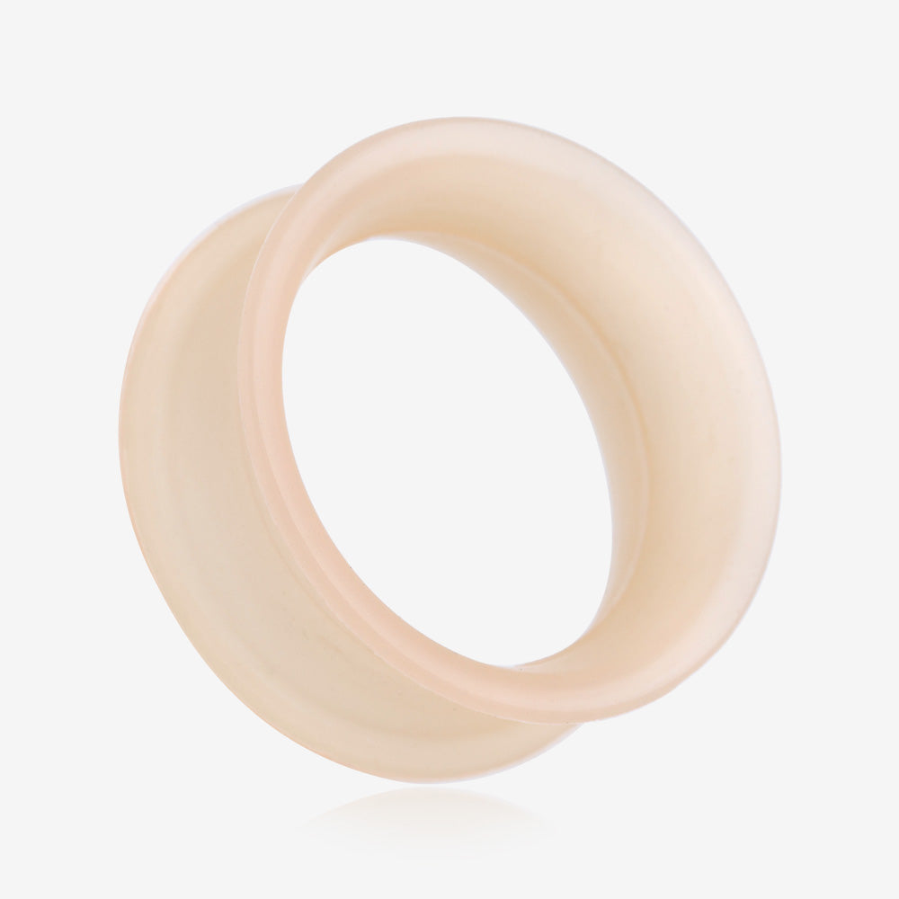 A Pair of Peach Tone Flexible Silicone Double Flared Tunnel Plug