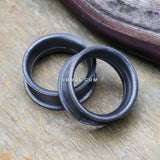 Detail View 1 of A Pair of Metallic Gunmetal Flexible Silicone Double Flared Tunnel Plug