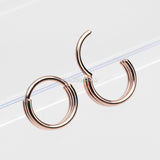 Detail View 2 of Rose Gold Triple Stack Hinged Steel Segment Clicker Ring