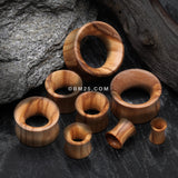 Detail View 2 of A Pair of Olive Wood Organic Double Flared Tunnel Plug-Orange/Brown